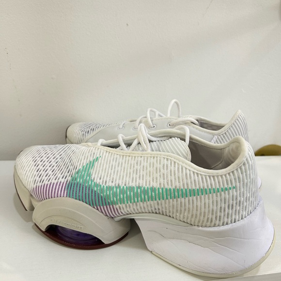 Nike Shoes - Nike Women’s White Running Shoes with Mint Swoosh
